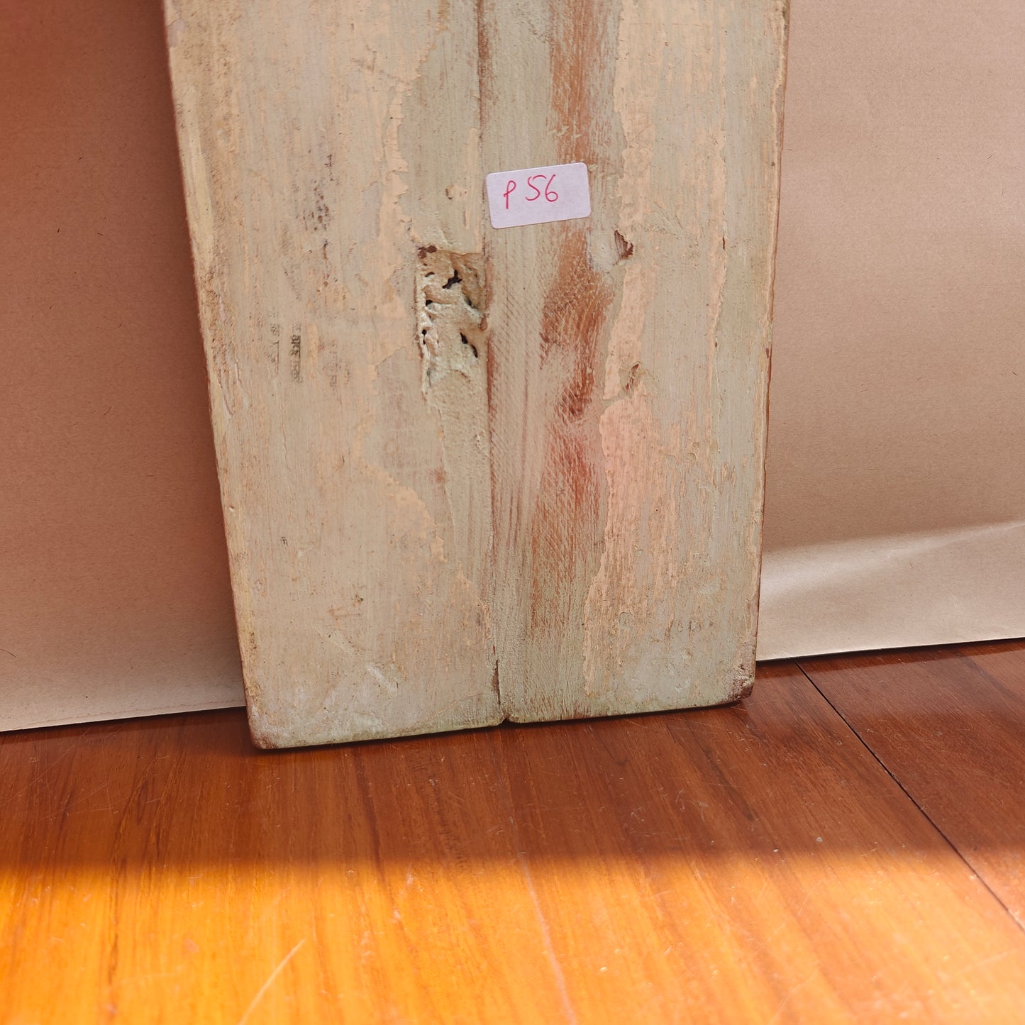Vintage antique patina mirror reflecting room interior
