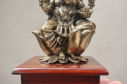 Brass Ganesha Idol on Wood Stand – 20 cm