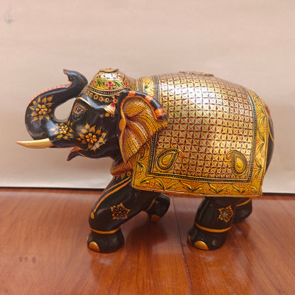Handpainted black and gold elephant decor – side view showing detailing