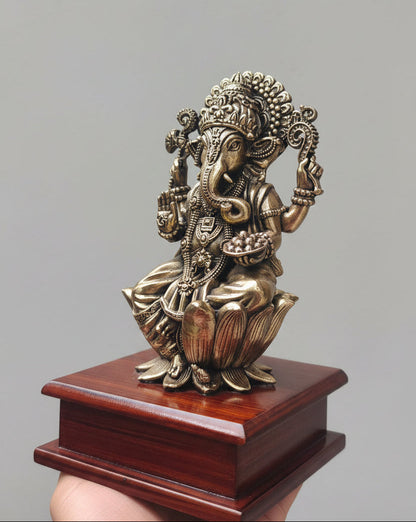  Detail of ornate arch and base on brass Ganesha statue