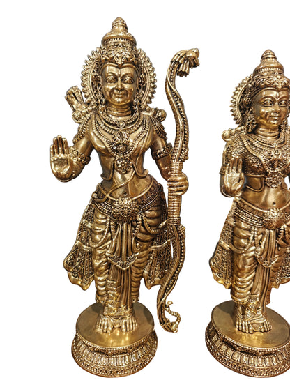 Close-up of brass Ram and Sita idols showing crowns and jewellery details