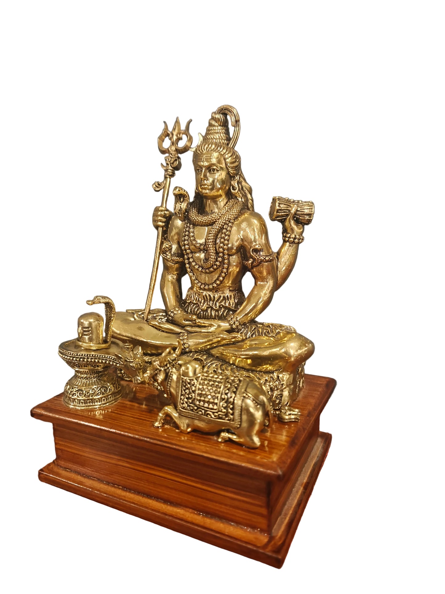 Angled view of brass Shiva with Nandi statue on wooden stand