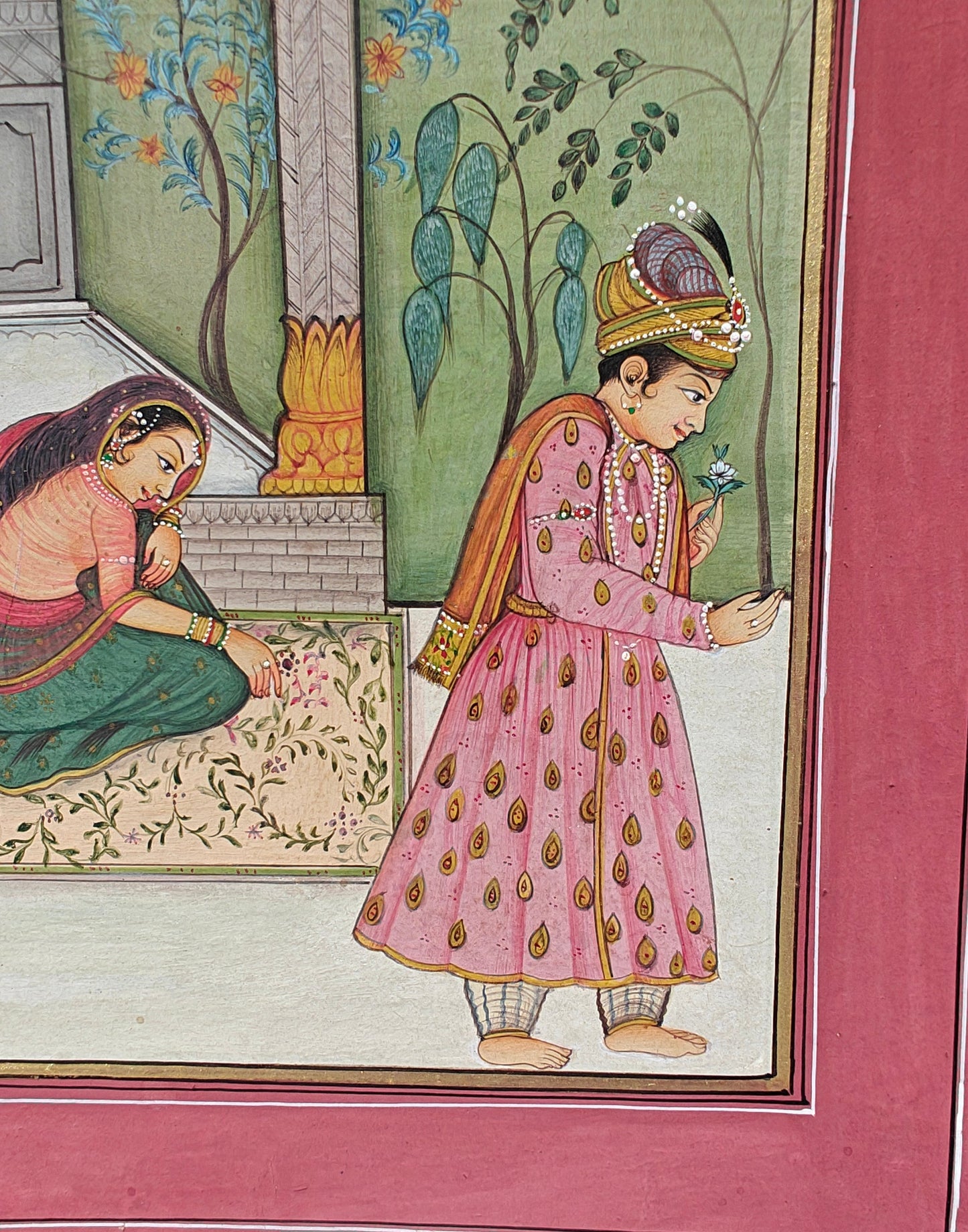Angled view of courtyard lovers miniature painting on paper showing texture and border
