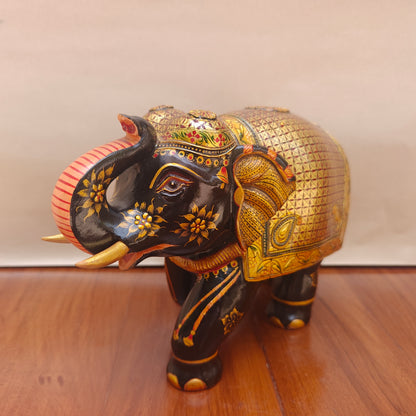 Handpainted black and gold elephant figurine – front view