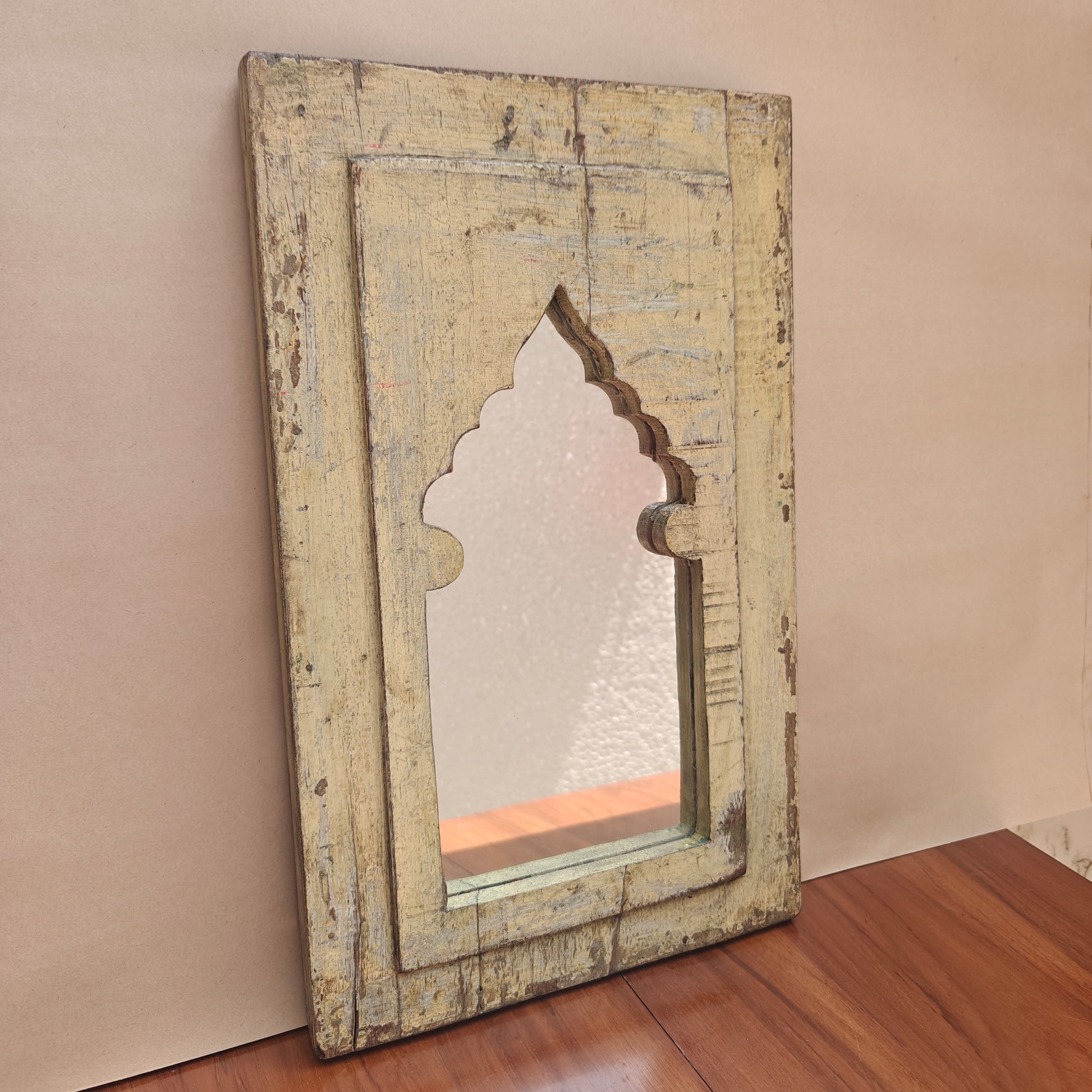 Distressed cream wood Jharokha mirror frame with arched mihrab design front angle
