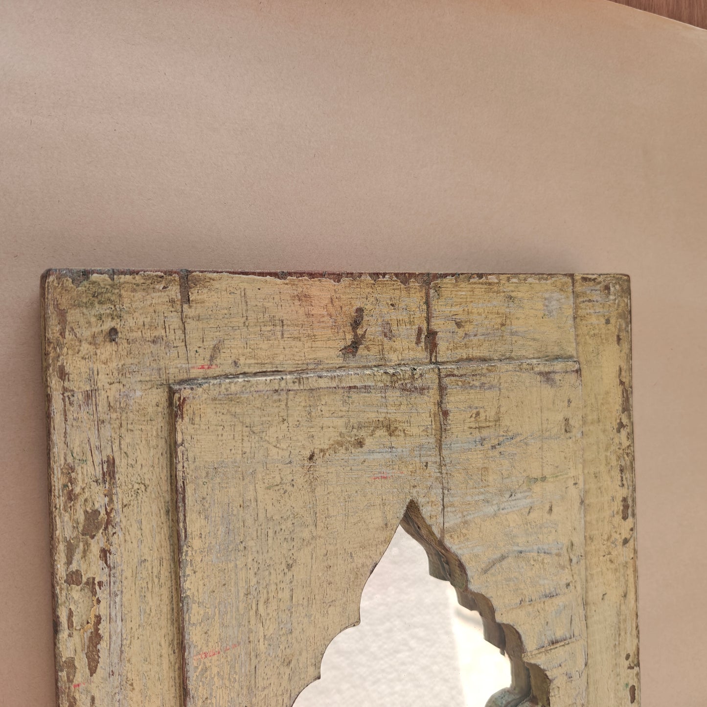 Close up of distressed wood texture and patina on Jharokha mirror frame corner