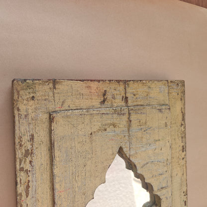 Close up of distressed wood texture and patina on Jharokha mirror frame corner