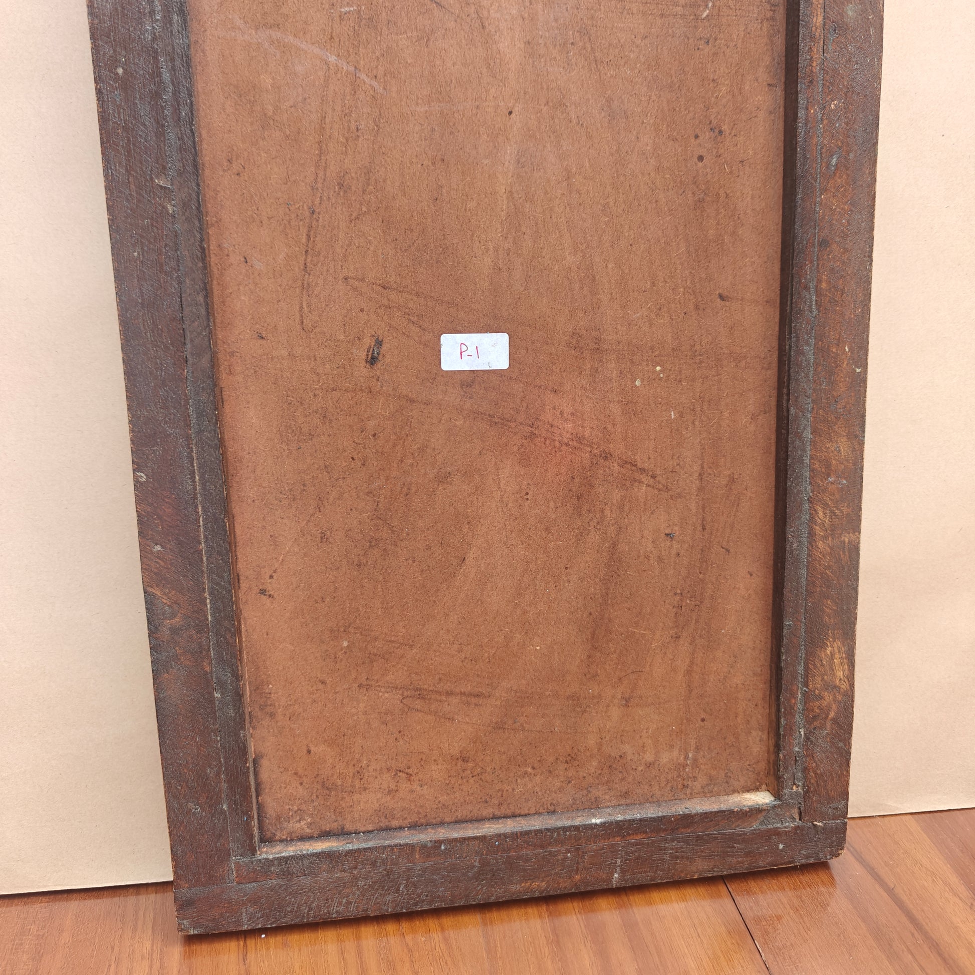 Back view of handcrafted wooden Jharokha mirror frame showing solid wood construction