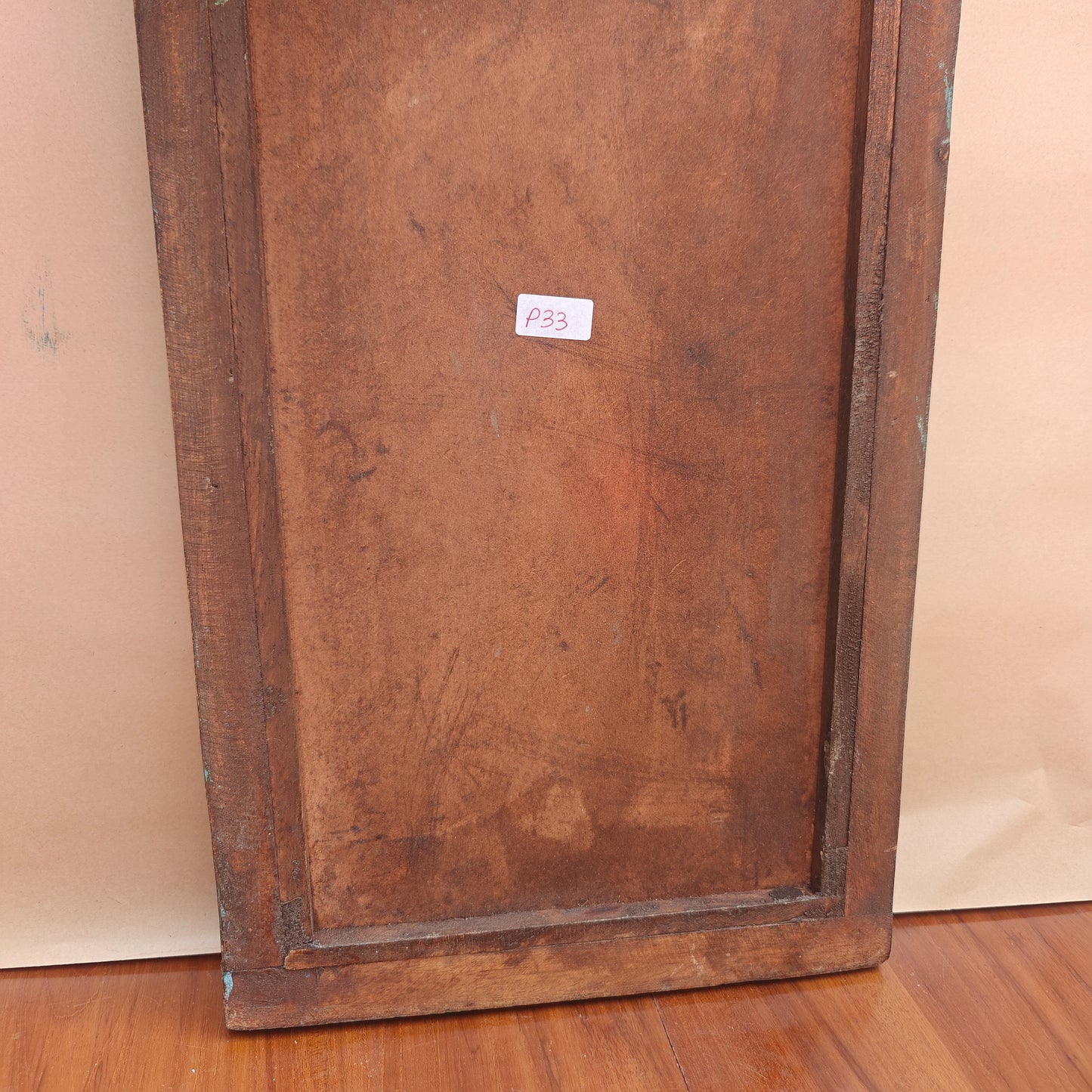 Back view of handcrafted turquoise Jharokha mirror frame showing solid wood construction