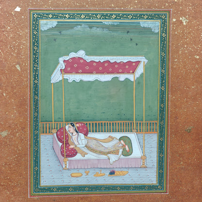 Close-up of reclining lady on bed in terrace scene miniature painting on paper