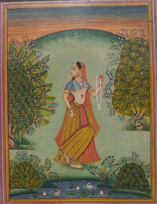 Angled view of Lady with Garland in Garden miniature painting on paper showing border and texture