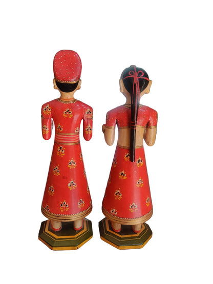 Octagonal painted wood base of Rajasthani wedding couple figurines