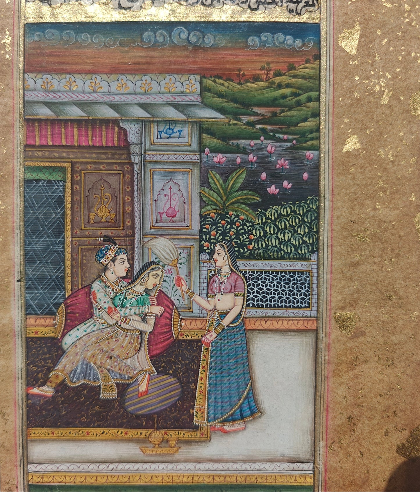 Close-up of royal couple seated on divan in terrace chamber miniature painting
