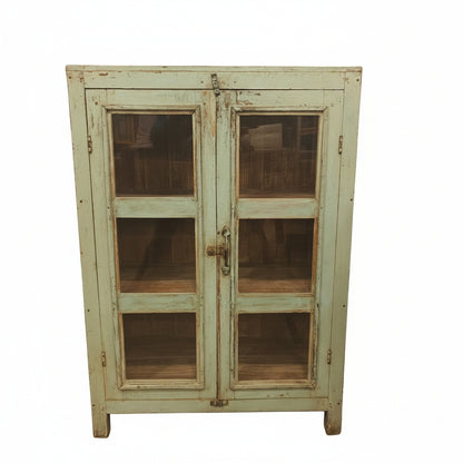 Vintage distressed mint blue glass display cabinet — three-quarter angle view showing side panels and top display