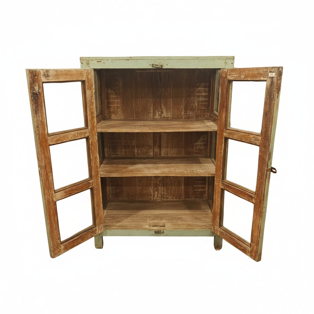Vintage Indian glass cabinet doors open showing three solid wood shelves — distressed mint blue finish, Timeless Treasures collection