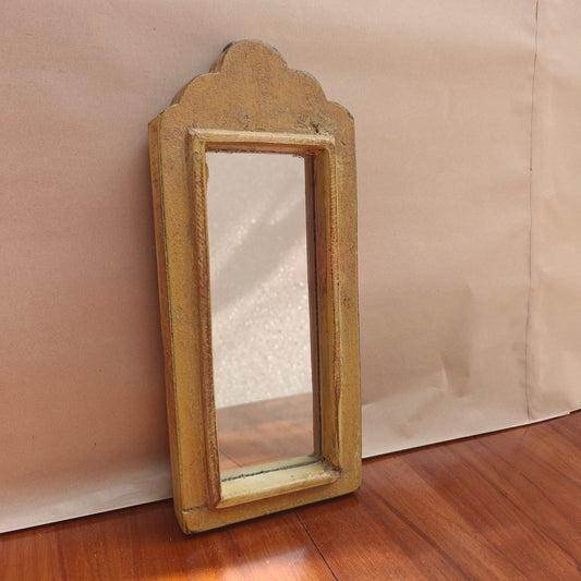 Vintage distressed mustard crown-top mirror, 28.5 x 12.5 cm, front view