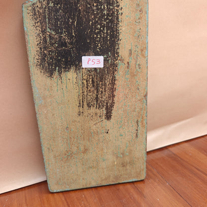 Vintage distressed teal mirror reflecting room interior