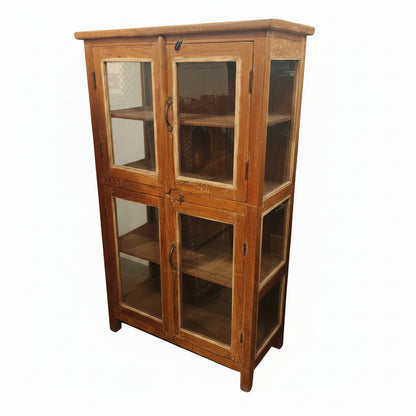 Antique Indian four-door teak glass cabinet with all doors open showing upper and lower shelving compartments — Timeless Treasures collection