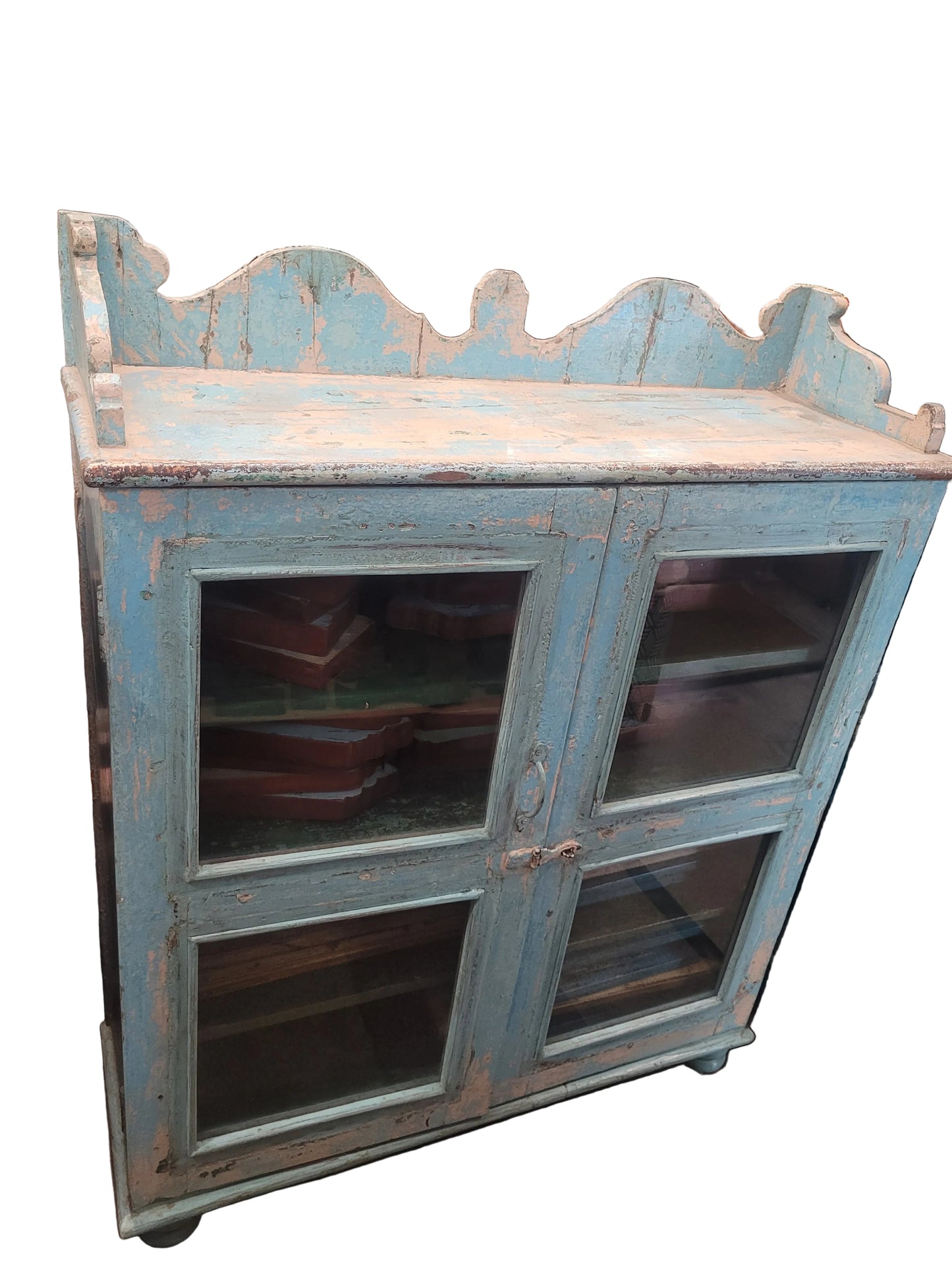 Vintage antique Jodhpur blue heavily distressed glass cabinet with scalloped gallery top, iron ring pulls and ball feet — Timeless Treasures collection, Poonam Backliwal