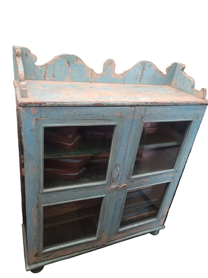 Vintage antique Jodhpur blue heavily distressed glass cabinet with scalloped gallery top, iron ring pulls and ball feet — Timeless Treasures collection, Poonam Backliwal