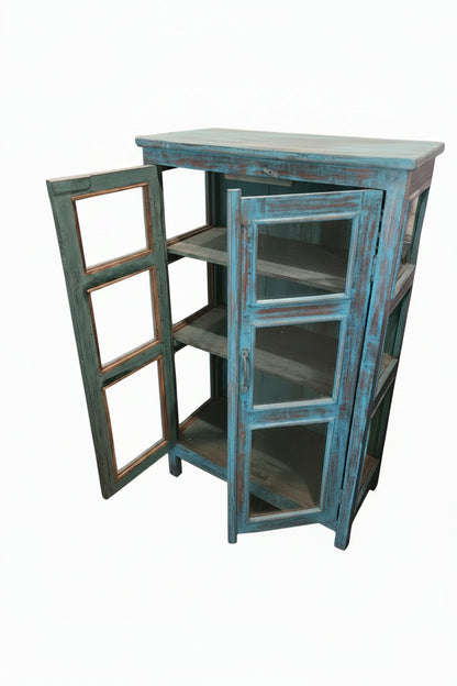 Vintage Indian peacock blue heavily distressed glass cabinet with iron latch — full front view, Timeless Treasures collection