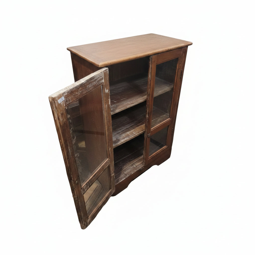 Vintage teak glass cabinet with door open showing three solid wood shelves — Timeless Treasures collection, Poonam Backliwal