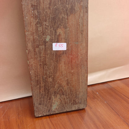 Vintage distressed whitewash mirror reflecting room interior