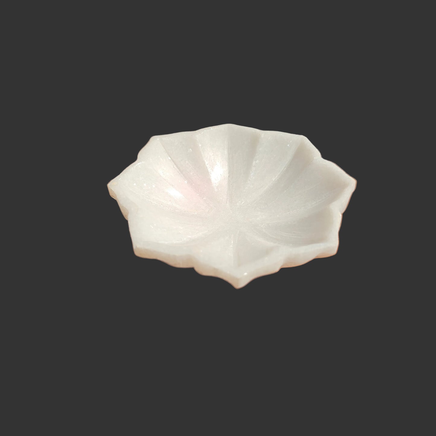 White marble flower bowl close up hand-carved ridges Rajasthan