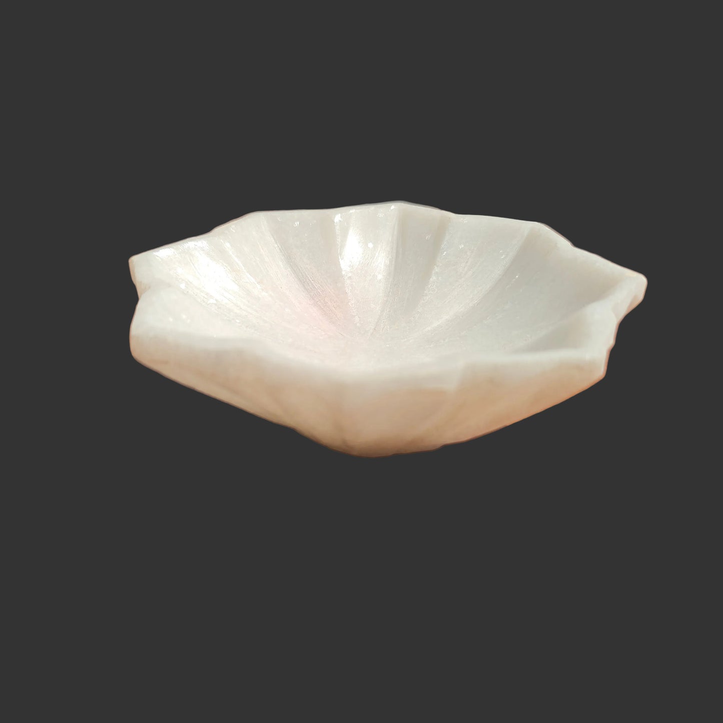 White marble flower bowl side view deep basin scalloped edge India