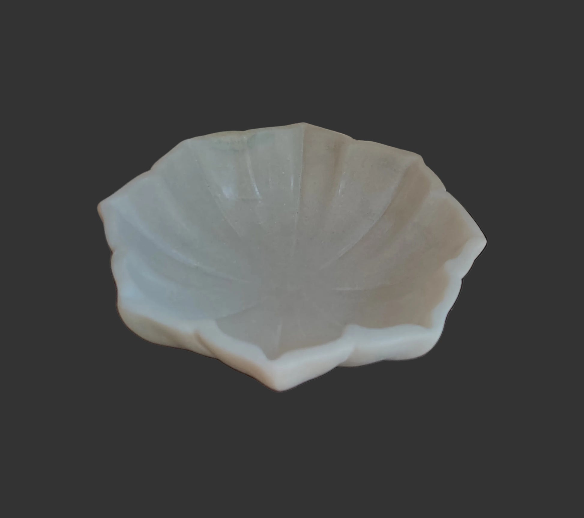 White marble flower bowl side view wavy scalloped edge design