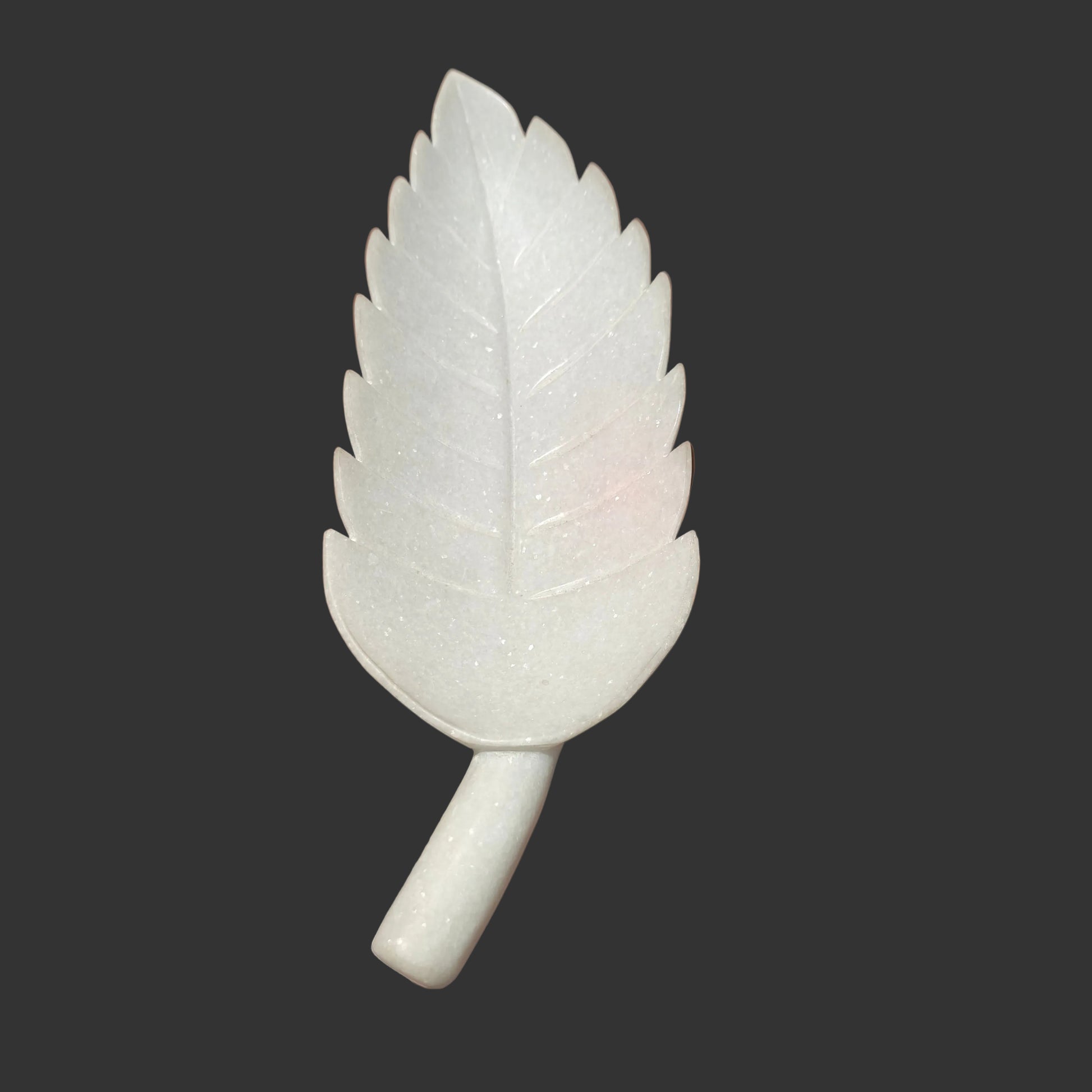 White marble leaf plate side view long narrow form with stem handle