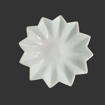 White marble star plate top view geometric pointed design Rajasthan